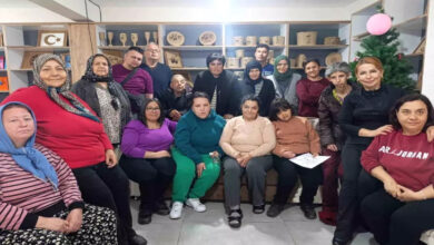 Fotoğrafta, engelli bireyler ve anneleri yer alıyor. Anneler Günü'nü özel bir etkinlik.